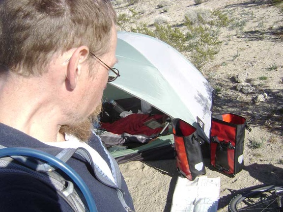 Back at my campsite near Kelso Dunes for a few minutes, I stuff a few items in my saddlebags for the ride to Coyote Springs