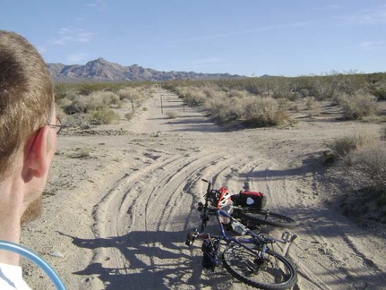 This sandy road-in-a-wash ends after a couple of miles and the rest of it ahead is blocked Wilderness barrier posts