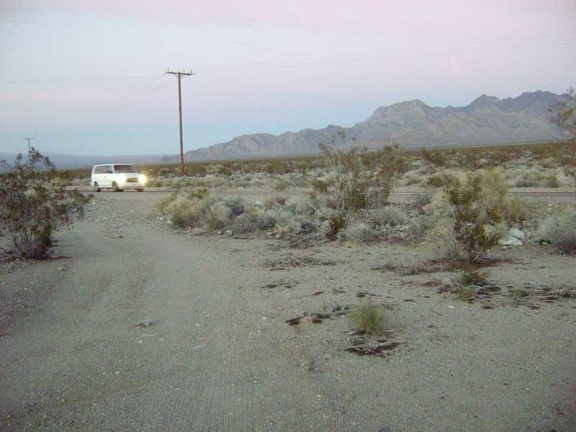 My dirt road from Coyote Springs ends at dusk when I reach the Kelbaker Road &quot;highway&quot;