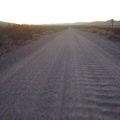 In the last vestiges of daylight, I rattle four miles down the Kelso Dunes Road washboard back to my tent