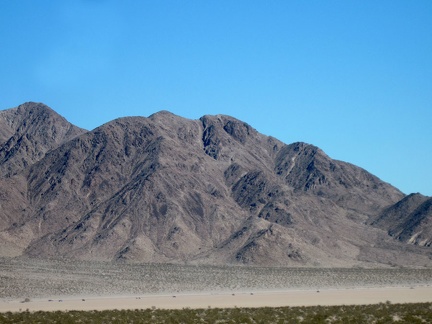 If I zoom in on Broadwell Dry Lake, I see a number of ant-like items on the playa that might be a convoy of 4WD vehicles