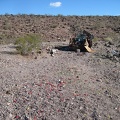 This little wash road in the Newberry Mountains foothills seems to end at the carcass of an old car used for target practice