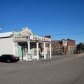 A small grocery store is the dominant living feature on Daggett's main street