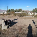 Before leaving Daggett, I stop at a forlorn park bench to change the batteries in my GPS