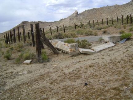 A broken-down brick cistern sits in the corral at Chicken Water Spring, Mojave National Preserve