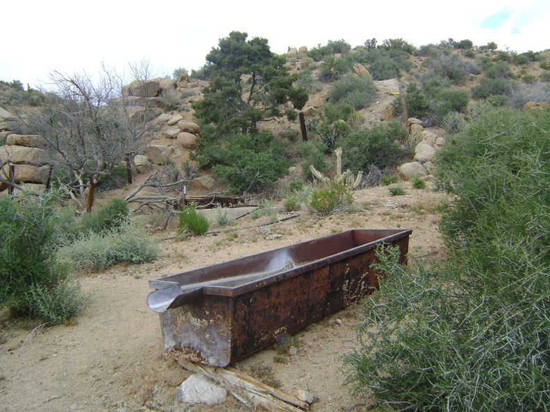 I stumble across an old rusty water trough near Silver Lead Spring, Mojave National Preserve