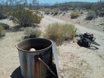 I notice a small water tank on the roadside and it's full of fresh, clean water