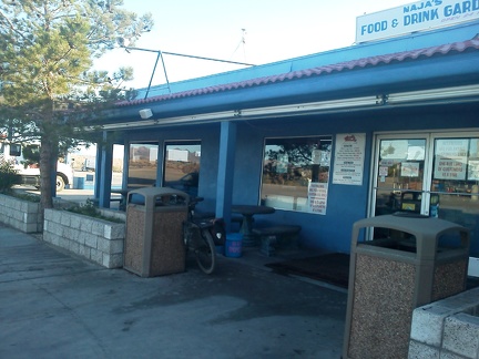 I take a good half-hour break in the shade of the Fenner store, drinking a couple of bottles of Sobe orange-carrot drink