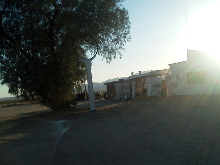 On the outskirts of Essex, CA, I stop to check out an old abandoned gas station and its empty sign