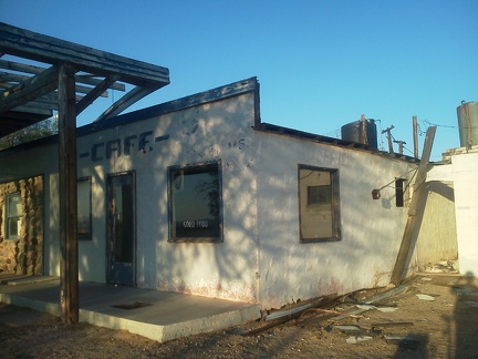 According to the windows at the old Essex Café on Route 66, 'good food' was served here