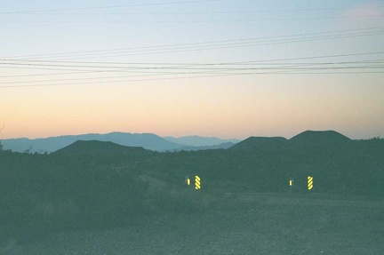 At the top of Kelbaker Road at 3800 feet, the last 20 miles into Baker at 925 feet will be a gentle downhill (in the dark)