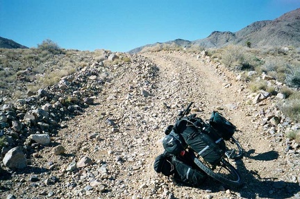 This short, rocky hill on the road to Foshay Pass requires that I drag the bike up the hill little by little
