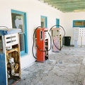 Old gas pumps sit in an alcove along the opera house's covered walkways
