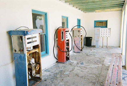 Old gas pumps sit in an alcove along the opera house's covered walkways