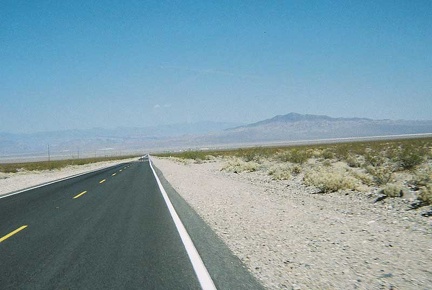 The tiny village of Death Valley Junction sits off in the distance another 7 miles or so