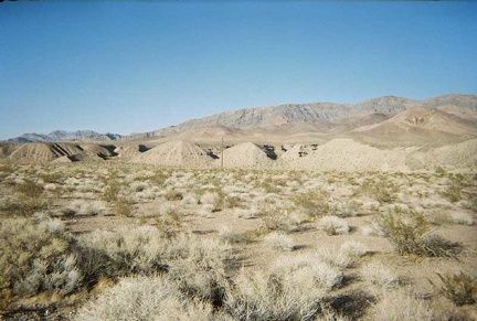 Interesting earth piles in front of the Resting Springs Range along Highway 127