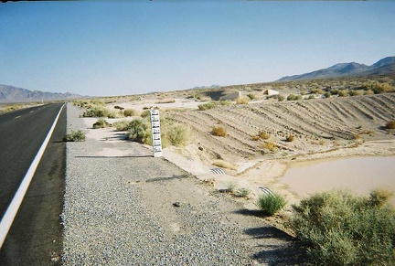 Flood markers along Highway 127