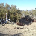 Board Spring Road veers off County Line Road into the brush in the middle of the photo on a slight downhill along the edge of the mountain.