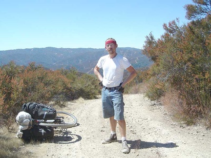 Bear Mountain Road drops off toward the valley below me.