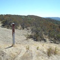 At the junction of the Bear Creek Trail: Bear Mountain Road heads downhill
