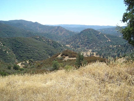 The bottom of the road in the canyon at Coyote Creek becomes visible.