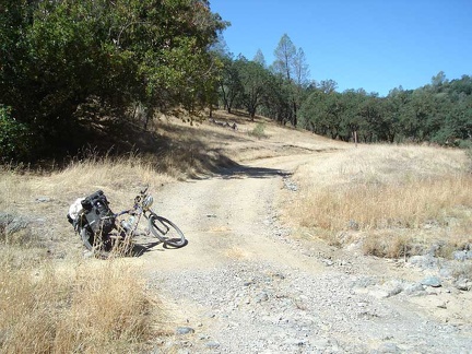 I walk the bike up the creek canyon to the bottom of Blue Ridge Road, where I begin the first climb of the day.