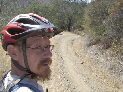 At the top of the County Line Road grade, it's time to begin the short descent down Coit Road into the Mississippi Creek canyon.