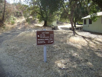 The sign on Coit Road near the Pacheco Camp cabin says that it's 16 miles to Park Headquarters.