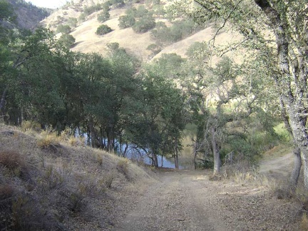 Paradise Lake sits in a private little valley at the bottom of a steep drop at the end of the road.