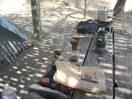 Making late-morning coffee at the picnic table at Mississippi Lake.