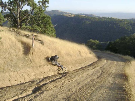 After climbing a short, steep segment of Hobbs Road, the 10-ton bike gets stuck on the drainage ditch that must be crossed.