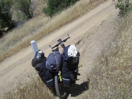 At the end of the Sierra View trail, the 10-ton bike has to cross that little drainage gulley where it got stuck last night.