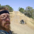 Hot and sweaty already, I park the 10-ton bike at the top of Coit Road and walk up the short hill to "Radio-tower Peak"