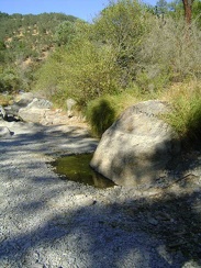 Before setting up camp, I check out the water situation at China Hole
