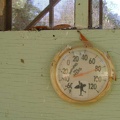 The thermometer on the shady side of the shower building shows 80 degrees F