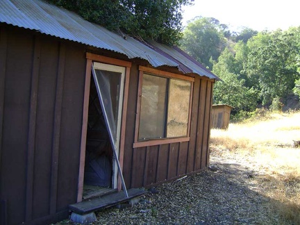 The side door to the Willson Camp cabin is open, so I step inside