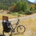 Packed up, the 10-ton bike and I leave Pacheco Camp and stop near the Pacheco Spring tub on the way out