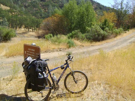Packed up, the 10-ton bike and I leave Pacheco Camp and stop near the Pacheco Spring tub on the way out