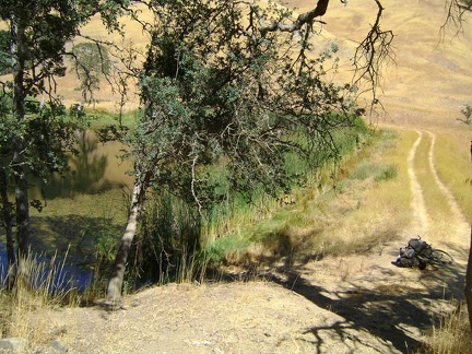 I ride across the dam to the other side of Paradise Lake, where I remember there being two campsites