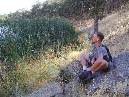 I find a comfortable spot along the lake to sit and absorb the peacefulness of the area for a few minutes