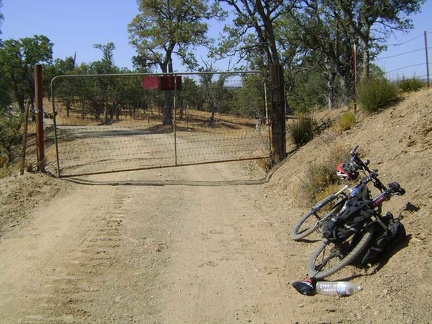 Red Creek Road merges with a piece of County Line Road, but is then blocked shortly afterward by a private-property gate