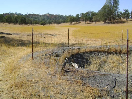 I check out a dry water hole in the middle of Upper San Antonio Valley and then decide to begin the trek back to Paradise Lake