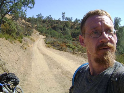 I walk back to the road and and begin the short ride back up to the summit of Red Creek Road