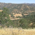 I stop at the first summit on the trail and take in the views of the ranch below and the quiet hills