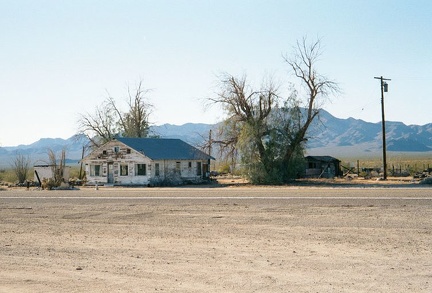 On the other side of Route 66 from the Essex post office sits this old house, which appears empty