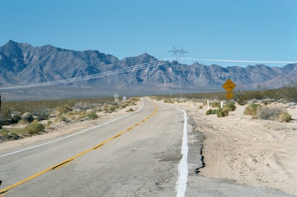 Looking northwest up Essex Road from the bottom of Black Canyon Road toward Mitchell Caverns and Providence Mountains