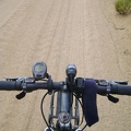 So far, west New York Mountains Road is well packed, but with a layer of sand or gravel on the surface