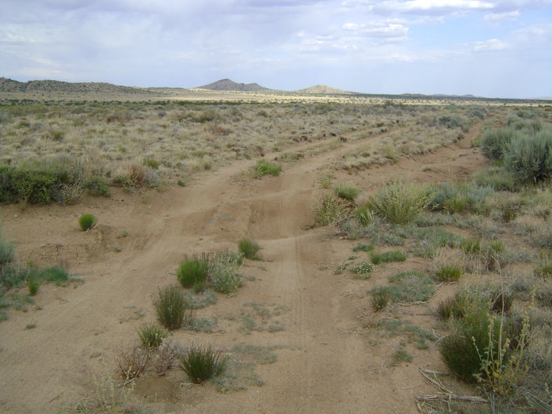 Howe Spring Road dips into several sandy washes as it hugs the west side of Pinto Valley