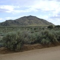 I stare at this unnamed mountain just south of Cedar Canyon Road while riding past it