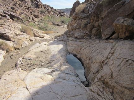 As for a pool of water at Hyten Spring, this litle tank in the rock is all I find today